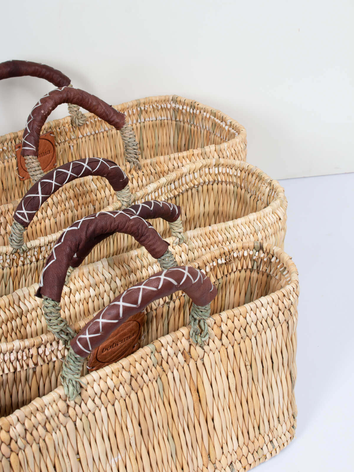 Reed baskets with leather