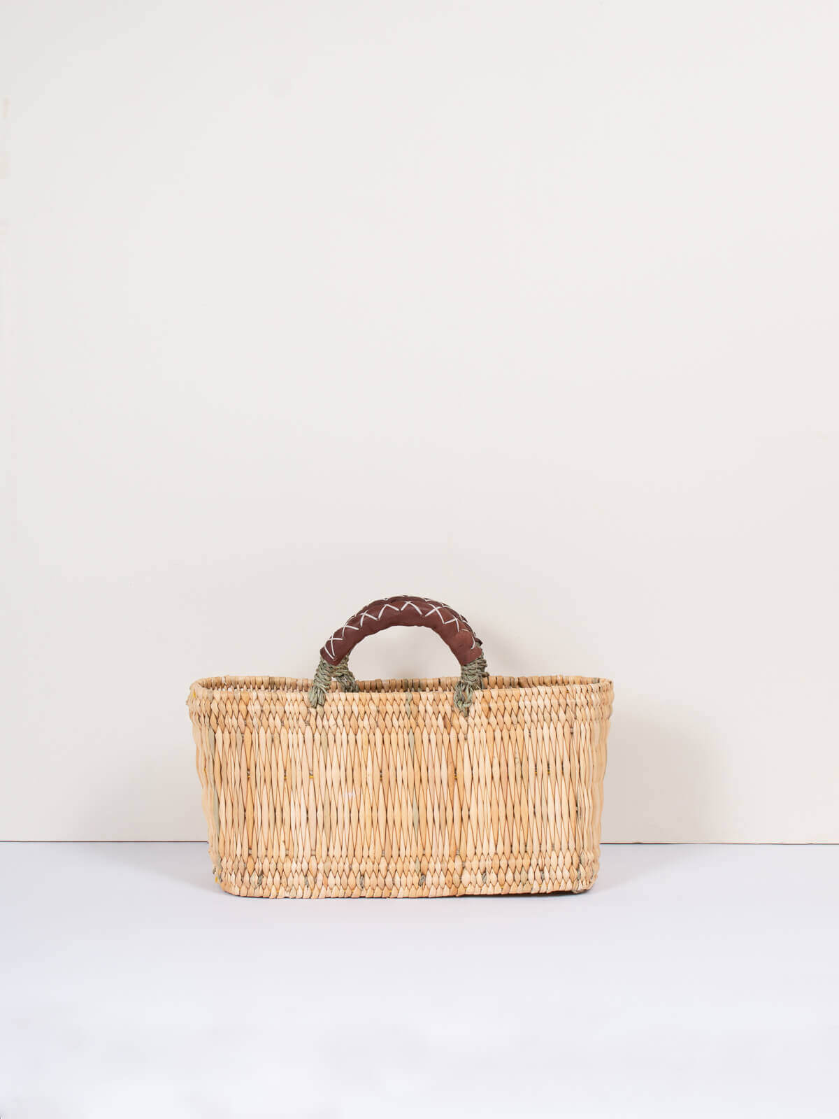 Reed baskets with leather